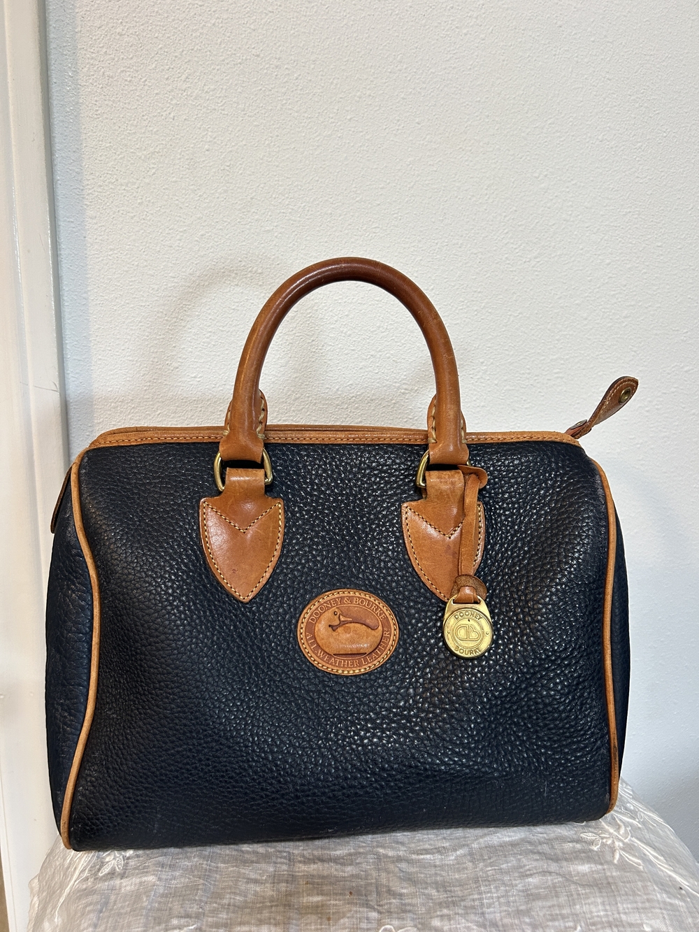 Dooney & Bourke Black Pebbled Leather Satchel with Tan Trim and Handles